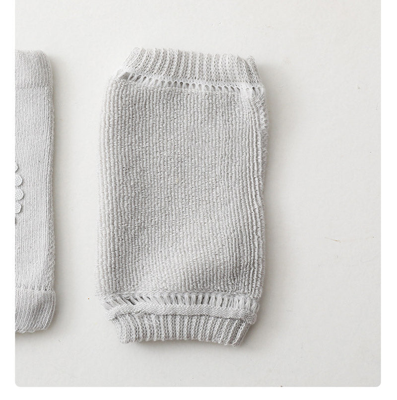Practical baby accessories: cotton knee pads & anti-slip socks set, perfect for gifting.