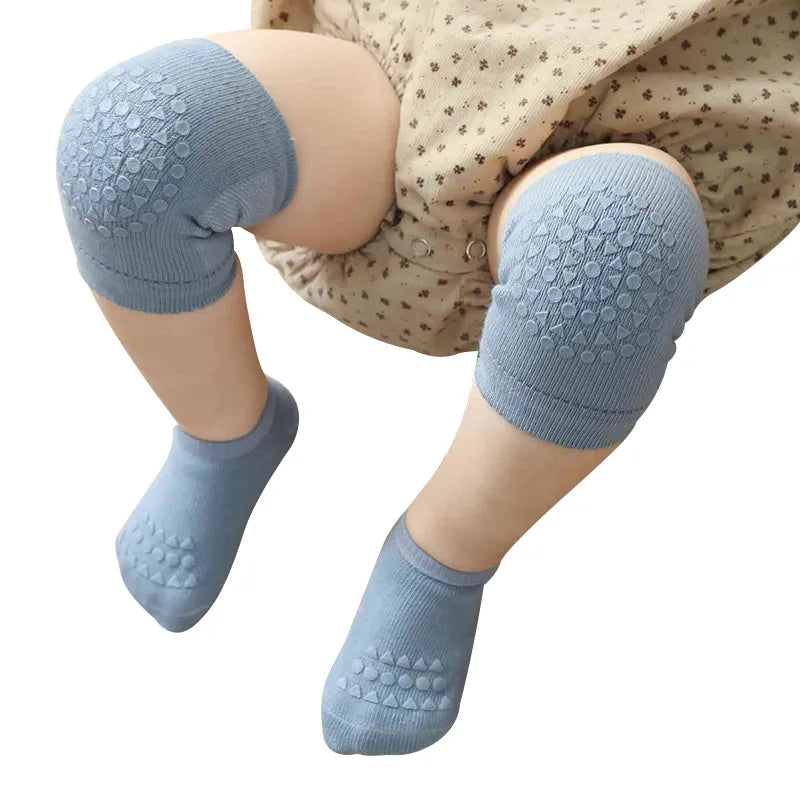 Toddler safety set: cushioned knee pads for crawling & grip socks for slippery surfaces.