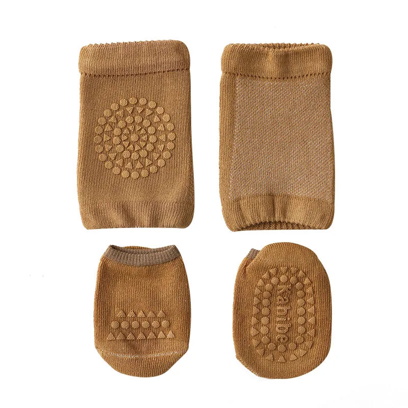 Blue baby crawling knee pads and coordinating anti-slip socks for floor safety.