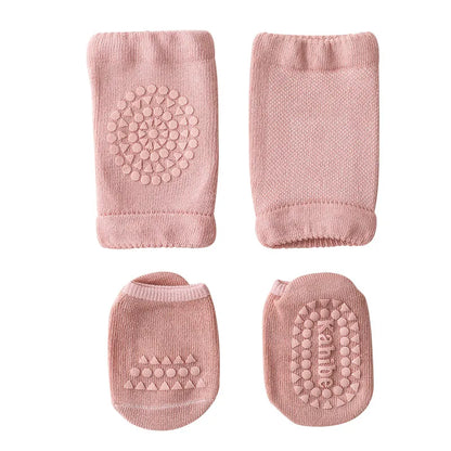 Happy baby wearing anti-slip socks & knee pads, crawling safely across a wooden floor.