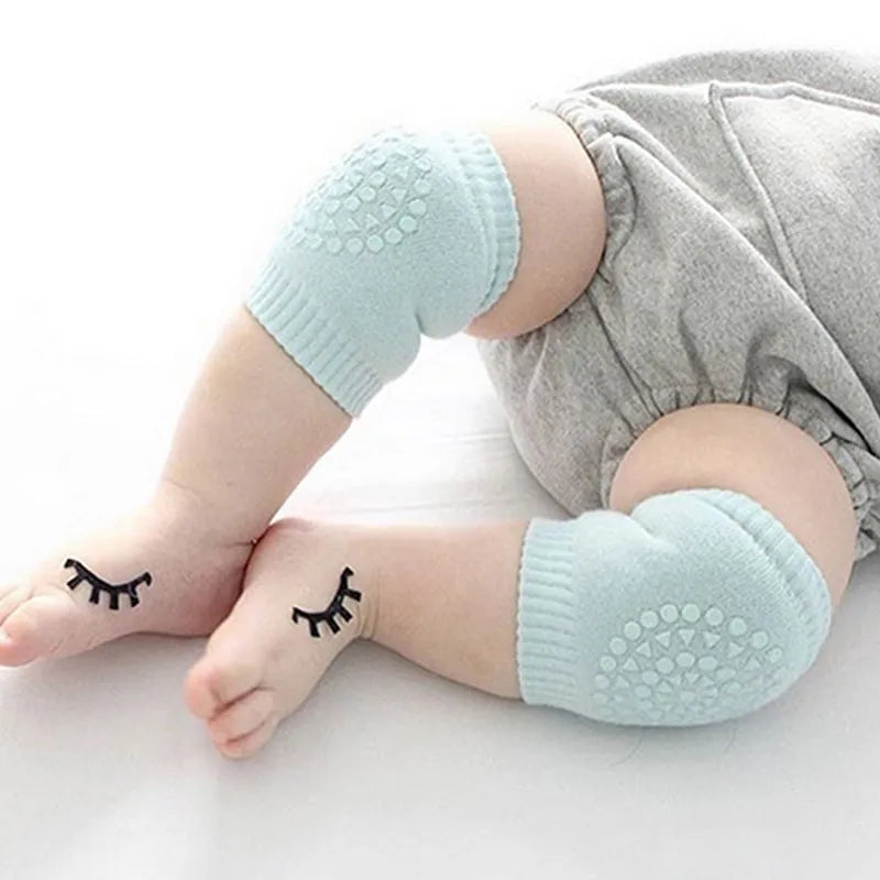 Adjustable baby elbow cushion for toddlers, fits snugly for active baby care, orange.