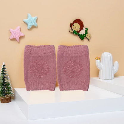 Set of baby safety knee pads and elbow cushions for crawling infants, multi-color pack.