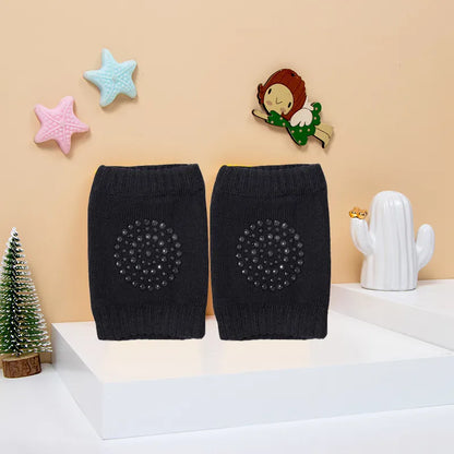 Soft cotton baby knee pads, essential baby accessory for new crawlers, white.