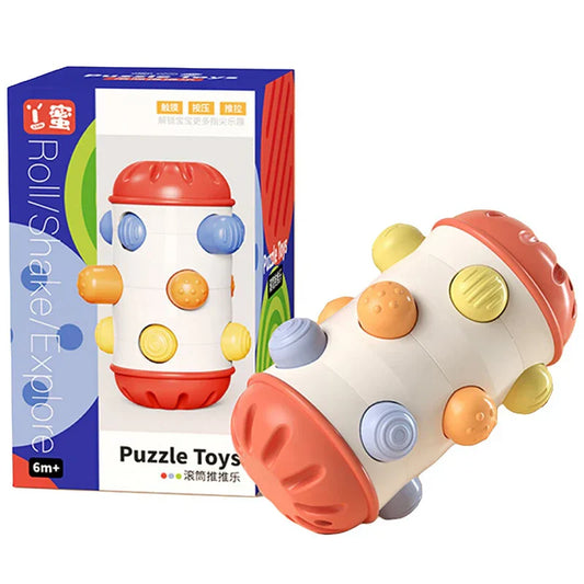 Baby crawling towards a colorful sensory developmental roll toy during tummy time