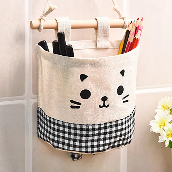 Decorate nursery with this functional crib caddy, a hanging storage bag for baby essentials
