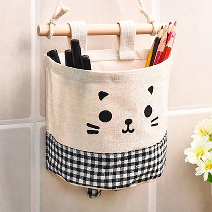 Decorate nursery with this functional crib caddy, a hanging storage bag for baby essentials