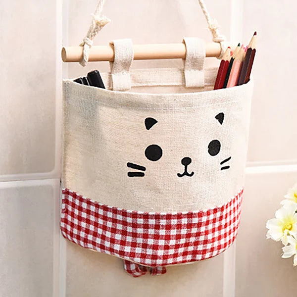 Stylish cotton linen baby storage bag, hangs on crib to store diapers, bottles, and wipes