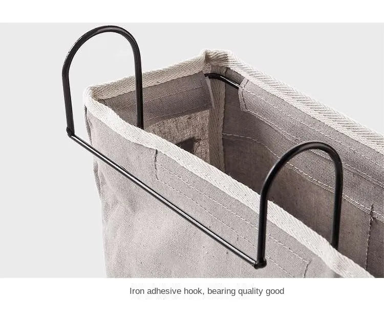 Modern nursery decor hanging organizer, holds baby essentials within reach from the crib.