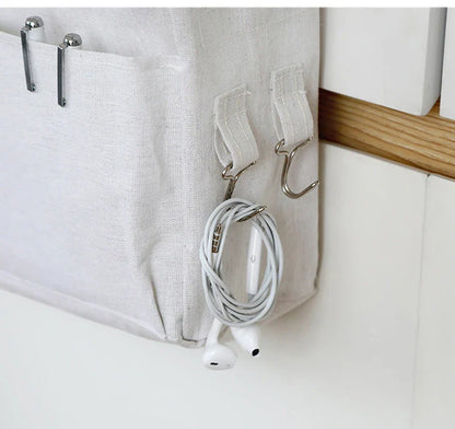 Essential cribside organizer for newborn care, convenient for parents to access baby items.