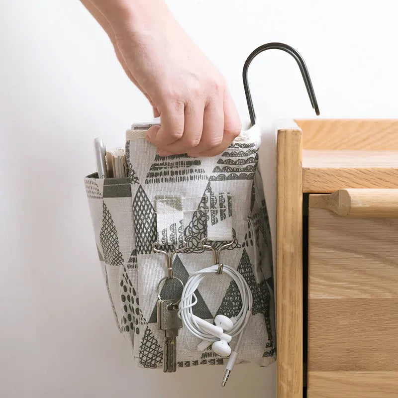 Stylish baby room hanging organizer, keeps newborn care items tidy and accessible.