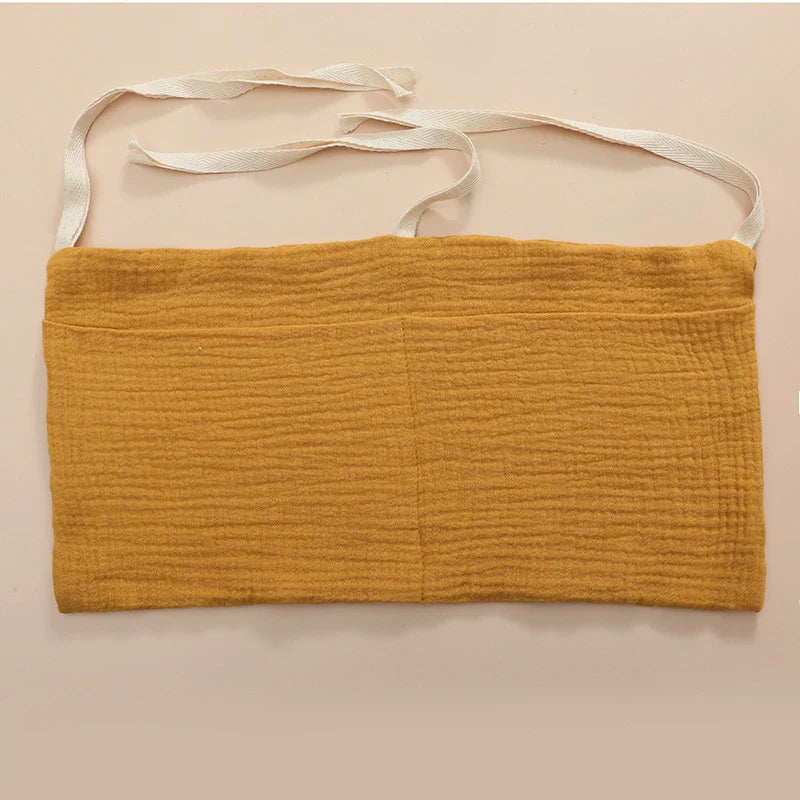 Baby room storage solution: cotton crib bag with ample space for toys and essentials.