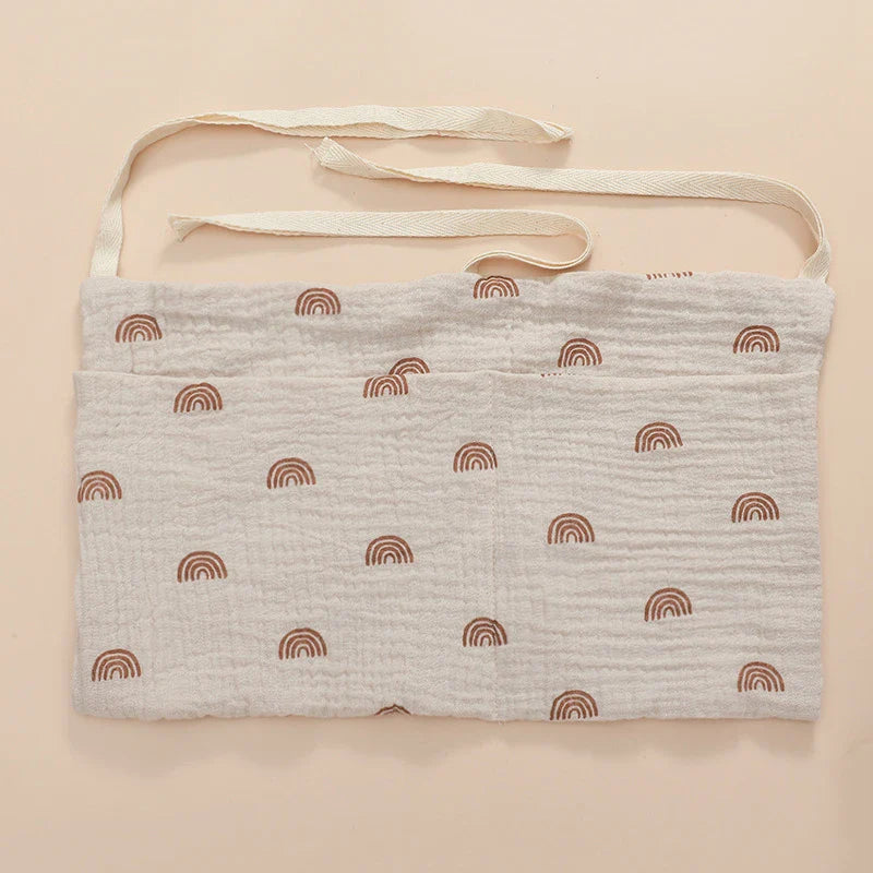 Soft, durable cotton crib organizer, designed to keep baby's essentials tidy and accessible.