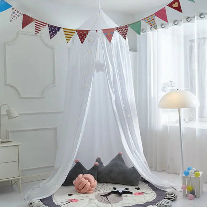 Toddler sleeping peacefully under a white dome mosquito net on a bed, bug guard, baby safety