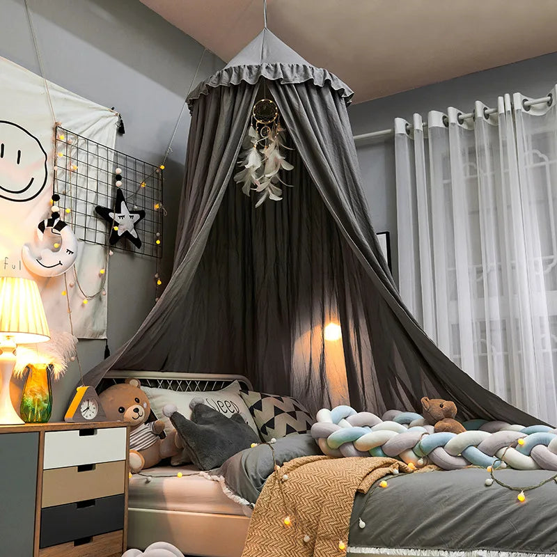 Baby crib with a decorative white polyester cotton dome mosquito net, essential infant protection