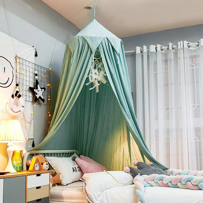 Stylish white dome mosquito net for baby's nursery, enhancing decor and providing bug guard