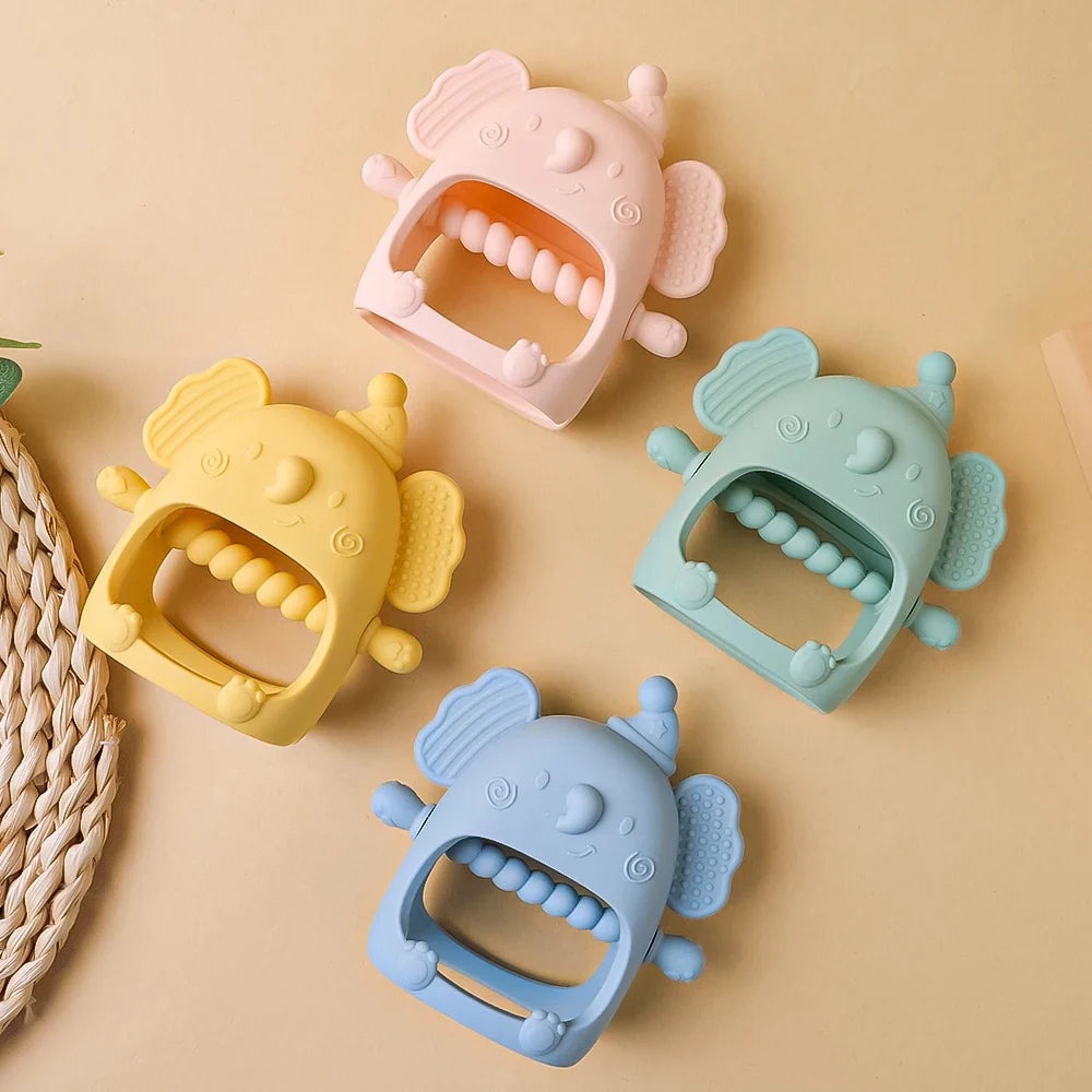 Delightful elephant-shaped silicone teether, offering gentle massage and effective gum pain relief for infants.