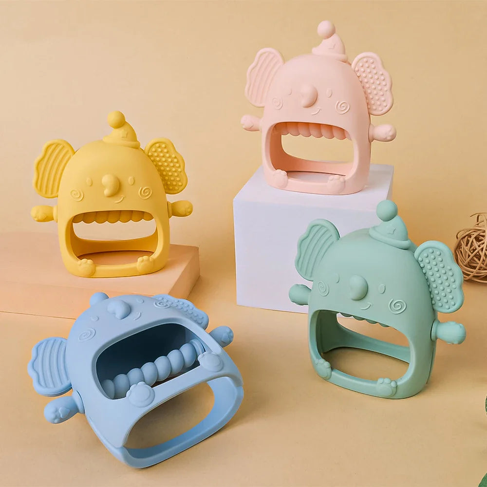 Close-up of soft grey silicone elephant teether, textured for effective gum massage and teething relief.