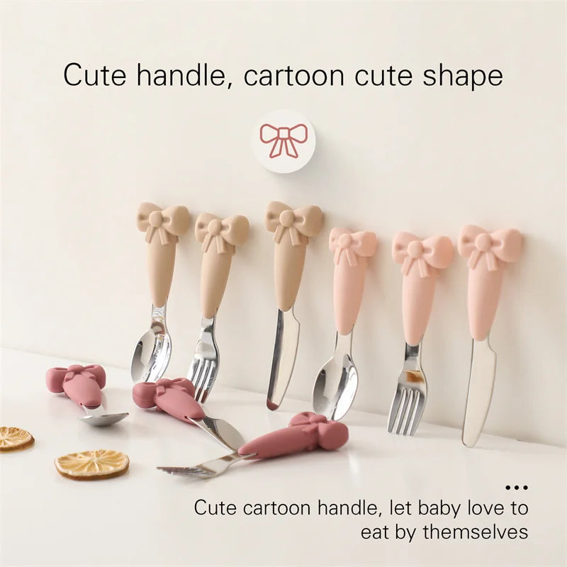 Non-slip silicone bowl and infant utensils, a stainless steel fork & spoon for baby-led weaning mealtime.