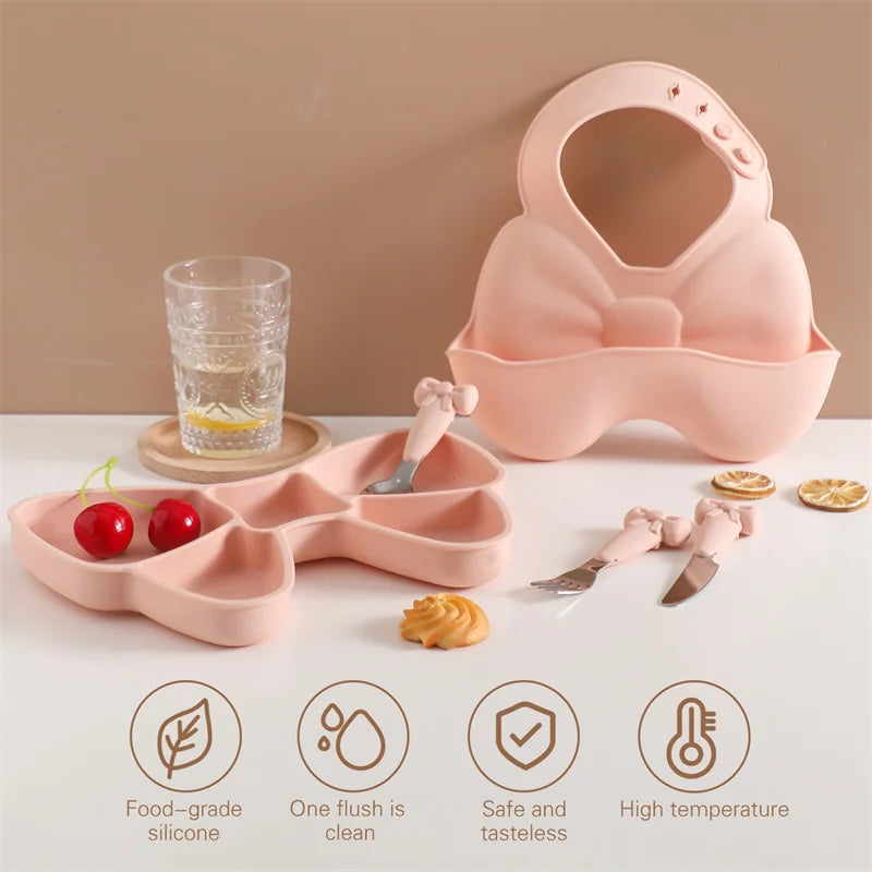 High-quality silicone baby bowl with suction base, paired with small stainless steel fork & spoon for meals.