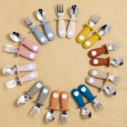 First foods baby spoon and fork set, made from food-grade silicone, encouraging self-feeding