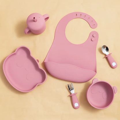 High-angle view of BPA-free baby feeding set, spoon and fork, for safe infant mealtime