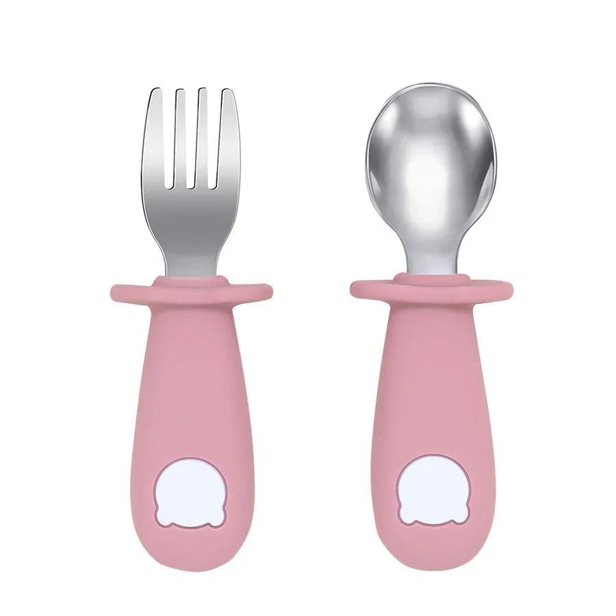 Textured silicone baby fork, ergonomic handle for little hands learning to self-feed