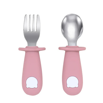Textured silicone baby fork, ergonomic handle for little hands learning to self-feed