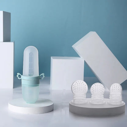 Modern baby feeding accessories: spoon for first solids & dropper for vitamins