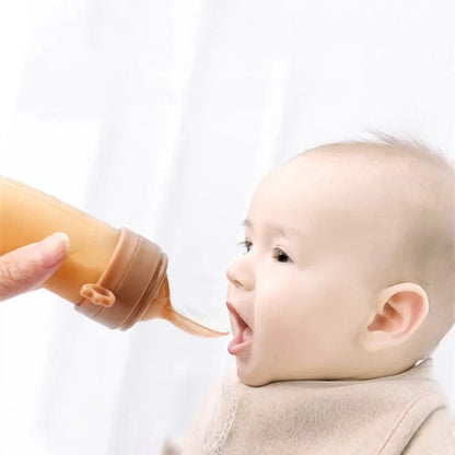 White baby feeding spoon & dropper set with ergonomic design for new parents