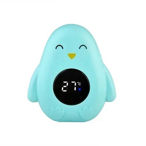 Child safety floating bath thermometer, measures water temperature digitally for peace of mind.