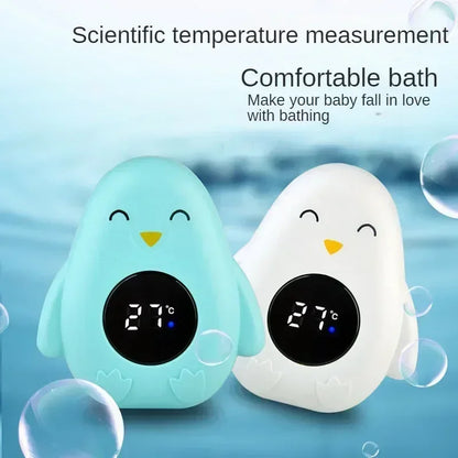 Digital thermometer for baby bath time, fun floating design with easy-to-read LED.