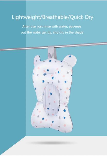 Close-up of star patterned fabric on a foldable baby bath support mat, soft and cushioned