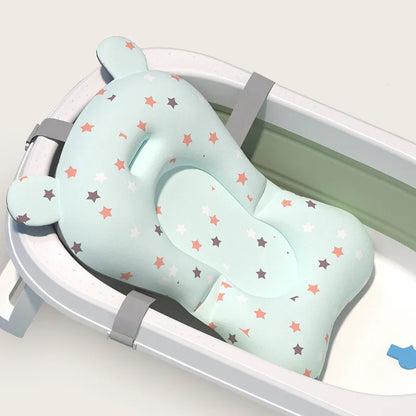 White baby bath support mat with gray stars, ensuring baby's comfort and safety