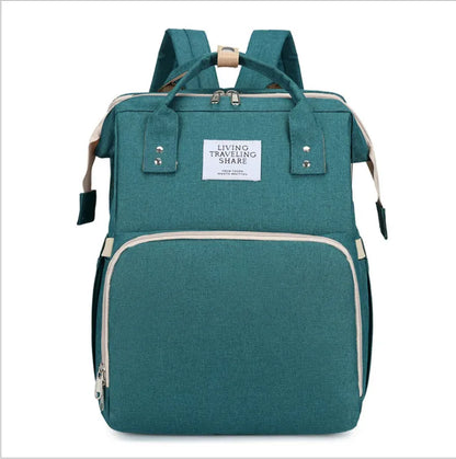 Gray baby backpack, folds into a crib, features USB charging capability and changing pad.