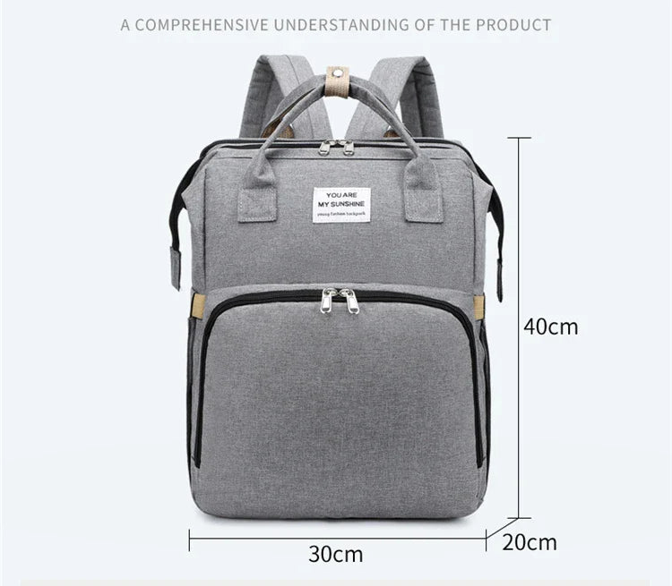 Parenting essentials: baby foldable crib backpack with USB, changing pad, and ample storage.