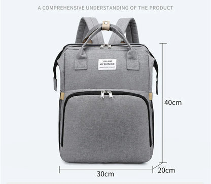 Parenting essentials: baby foldable crib backpack with USB, changing pad, and ample storage.