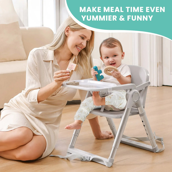 Infant feeding solution: Baby Folding Booster Seat High Chair on a dining chair, neutral color