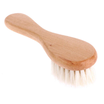 Bath time essential: Soft silicone scalp massager brush for babies, promoting relaxation.