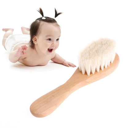 Baby Gentle Scalp Massage Brush displayed on a white background, highlighting its soft design.