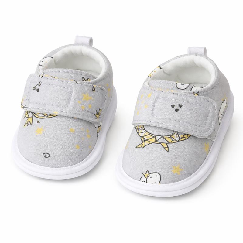 Close-up of baby tiger print first walking shoes with a durable non-slip sole