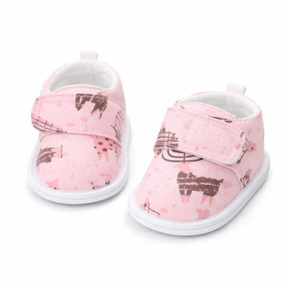 Soft-soled baby elephant print shoes for early walkers, featuring non-slip grip