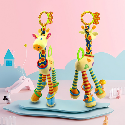 Baby giraffe teether and rattle, yellow, white and brown for sensory development in infants.
