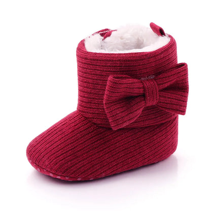 Infant first walker shoes: Pink bowknot winter boots with a comfy soft sole