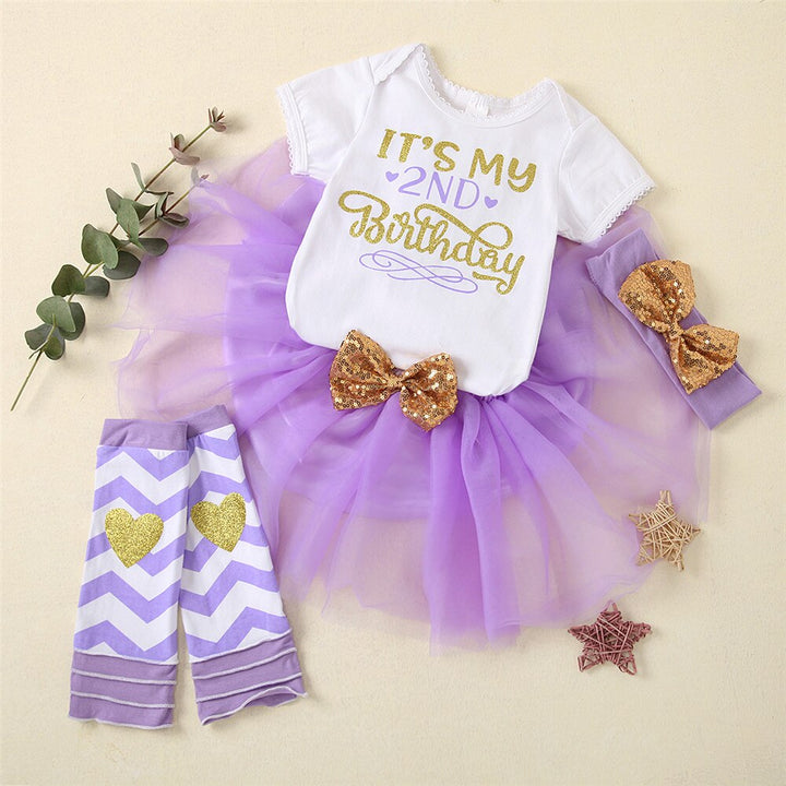 Celebrate a first birthday with this charming baby girl romper, tutu & leggings set