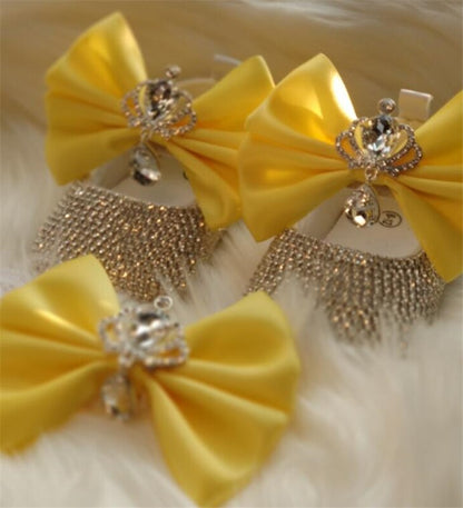 Delicate baby girl first walker shoes with intricate beading and a charming bow plus coordinated headband