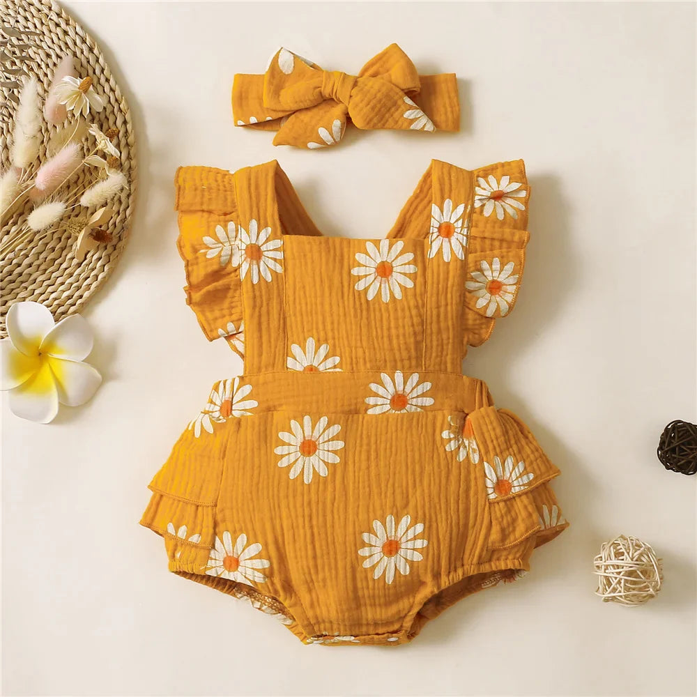 Little girl's floral pattern ruffle romper with a matching bow headband