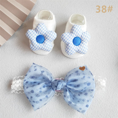 Two-piece baby girl accessories set, including a charming lace bow headband & pink socks