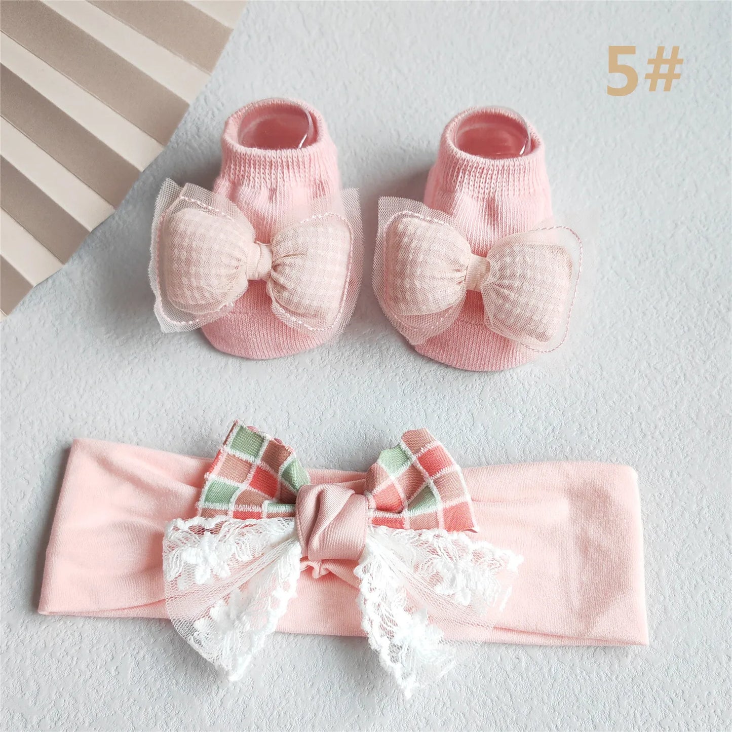 Baby girl's essential: soft pink cotton socks, ideal for newborns to 12-month-olds