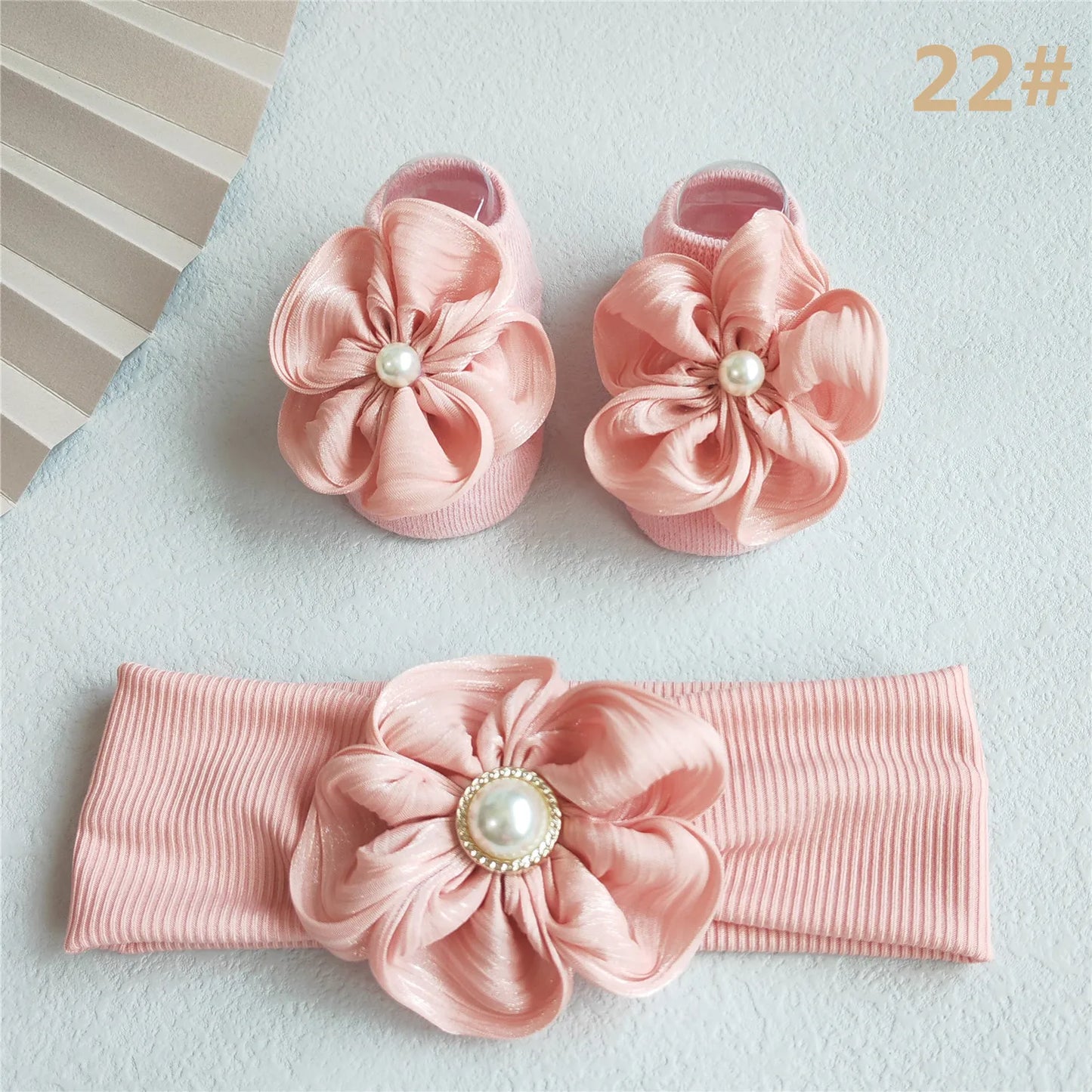 Detailed view of the baby girl's lace hair bow, perfect for a princess-themed outfit
