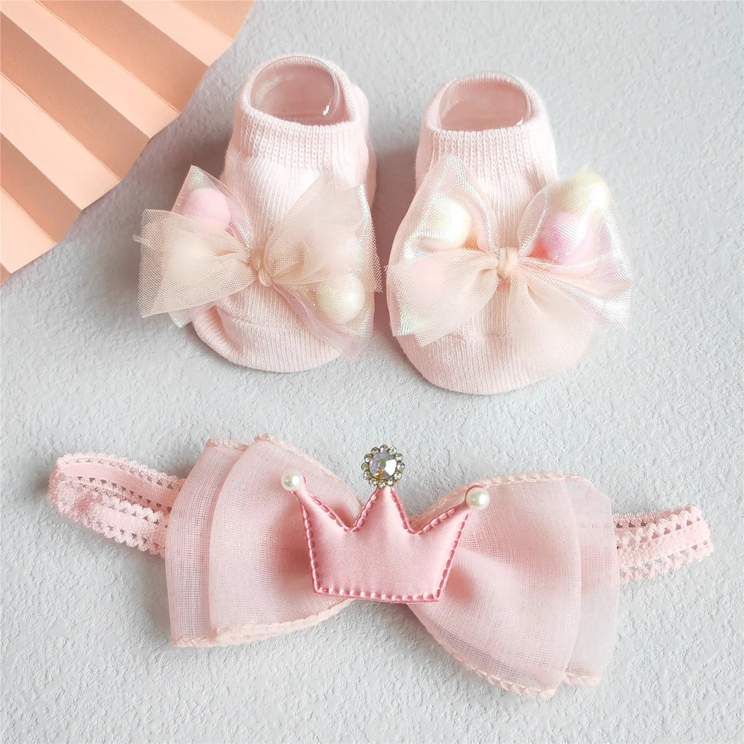 Set of baby girl cotton socks in soft pink for 0-12 months, featuring a gentle design